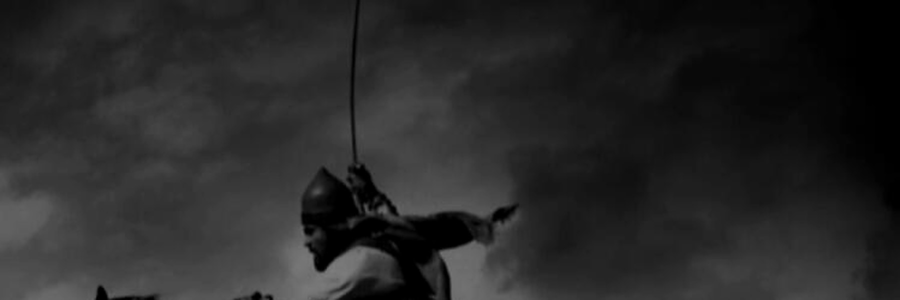 A lone warrior rides into the storm